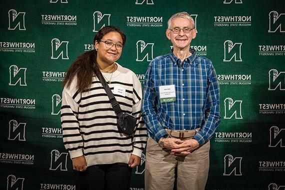 Emma Eastin (right) is pictured with Clark Israel, a son of Lewis and Elda Israel, at Northwest's Powering Dreams celebration of donors and scholars in September. (Northwest Missouri State University photo)